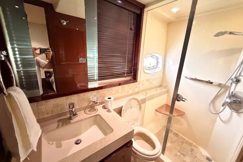 Slide: The Image of Luxurious bathroom in 2010 Sea Ray Sundancer 540 yacht with modern fixtures and shower. - 9