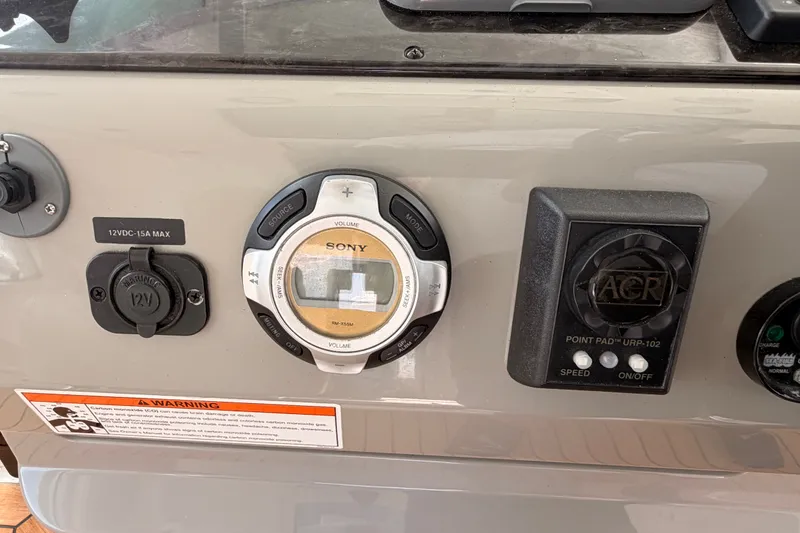 Slide: The Image of Control panel of a 2010 Sea Ray Sundancer 540 with Sony audio system and ACR controls. - 18