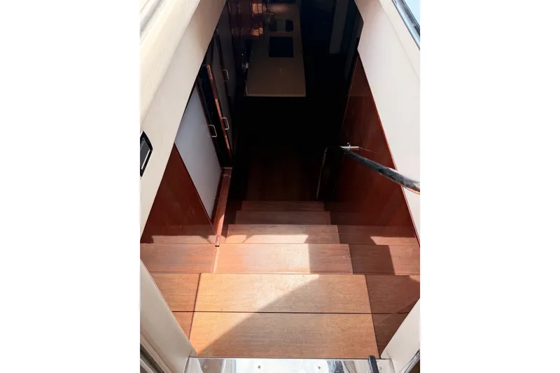 Slide: The Image of Staircase leading to cabin interior of 2010 Sea Ray Sundancer 540 yacht. - 17