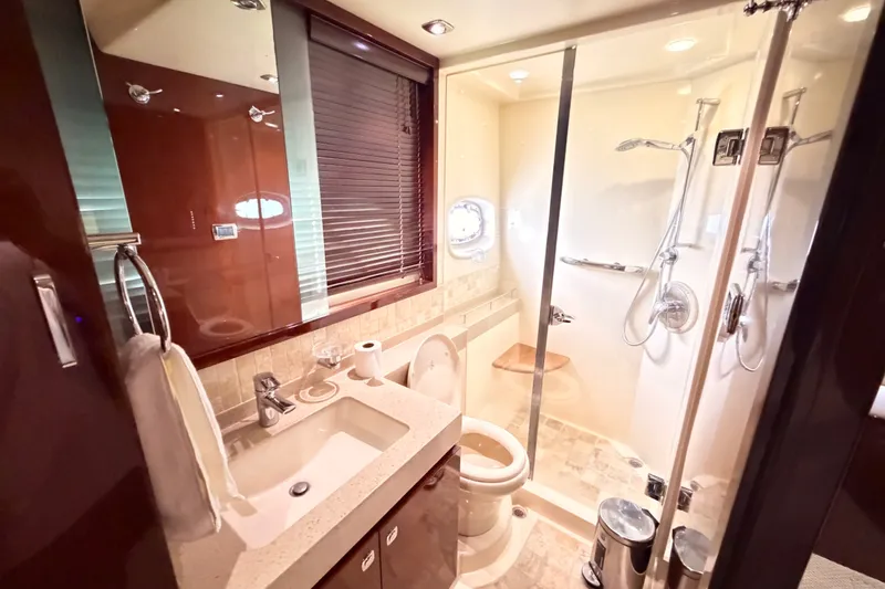 Slide: The Image of Luxurious bathroom in 2010 Sea Ray Sundancer 540 yacht with modern fixtures and elegant design. - 10