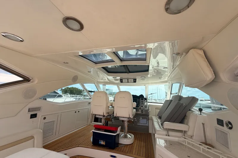 Slide: The Image of Luxurious interior of 2010 Sea Ray Sundancer 540 yacht with plush seating and modern design. - 25