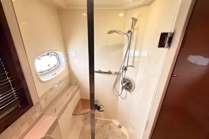 Slide: The Image of Luxurious shower in 2010 Sea Ray Sundancer 540 yacht, featuring modern fixtures and elegant design. - 8