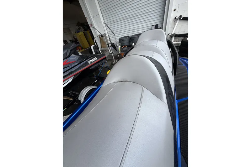 Slide: The Image of 2017 Yamaha WaveRunner VX Limited HO with sleek gray seating in a garage setting. - 13