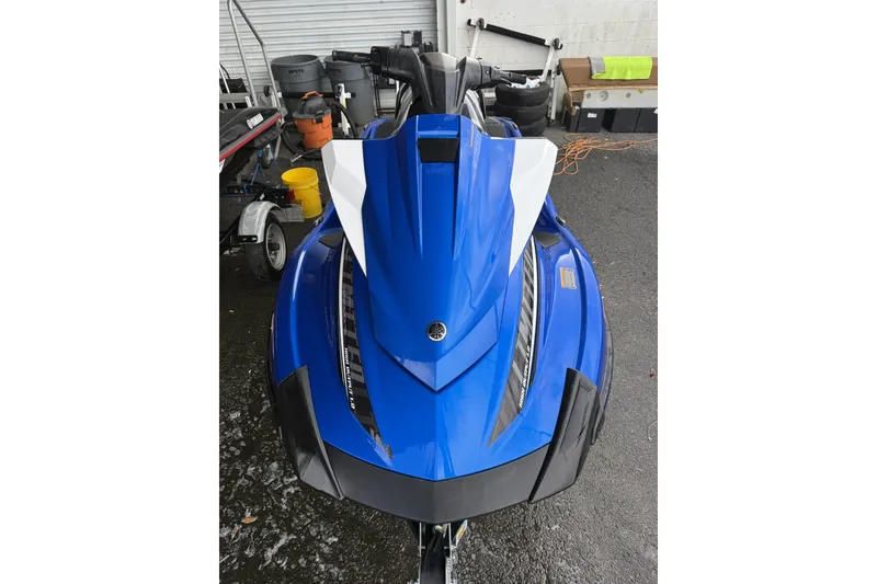 Slide: The Image of 2017 Yamaha WaveRunner VX Limited HO in blue, parked outdoors. - 6
