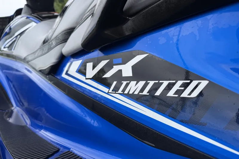 Slide: The Image of 2017 Yamaha WaveRunner VX Limited HO, close-up of blue body and logo. - 2