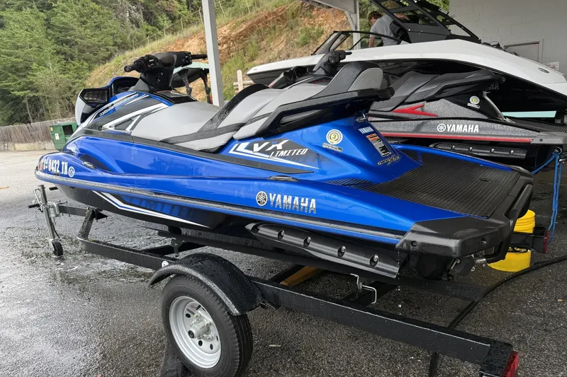 The Image of 2017 Yamaha WaveRunner VX Limited HO in blue on a trailer, parked outdoors. - 1