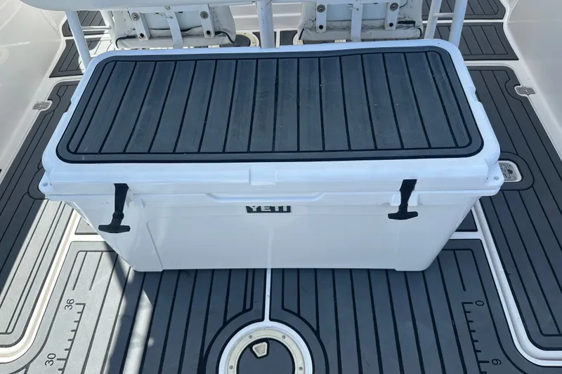 Slide: The Image of YETI cooler on 2007 Donzi 35 ZF Cuddy boat deck with non-slip flooring. - 19