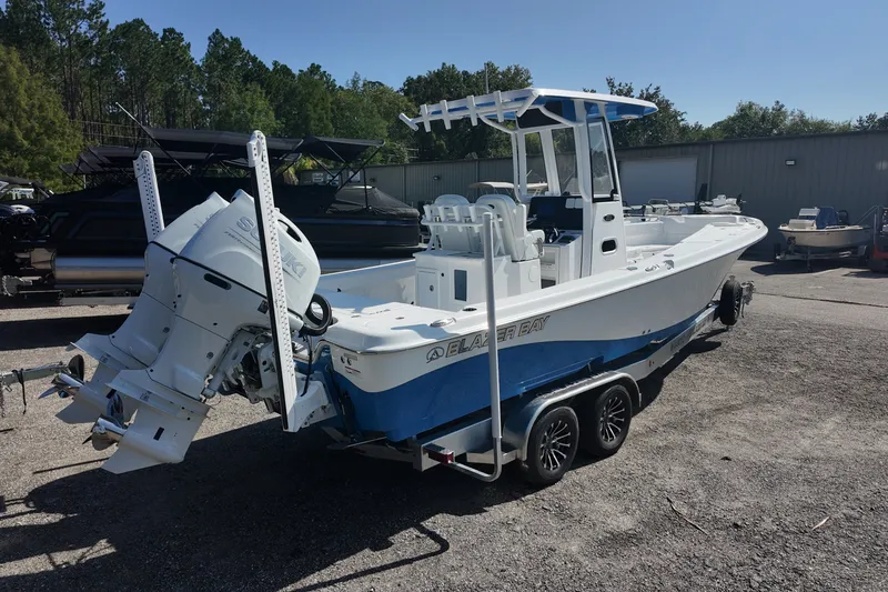 The Image of 2027 Blazer Bay Makaira 2800 boat with Suzuki outboard engine on trailer. - 0