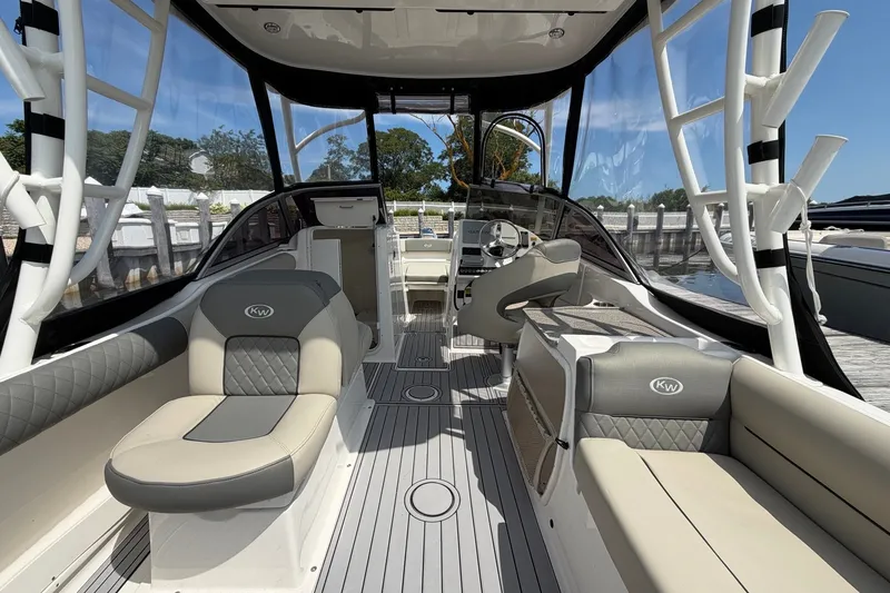 Slide: The Image of 2025 Key West 239 DFS boat interior with luxurious seating and modern design. - 14