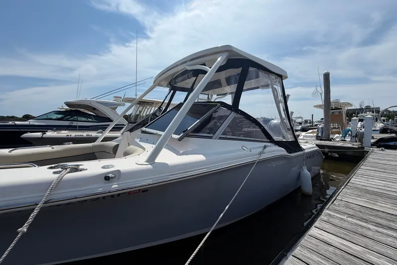 Slide: The Image of 2025 Key West 239 DFS boat docked at marina under clear sky. - 27