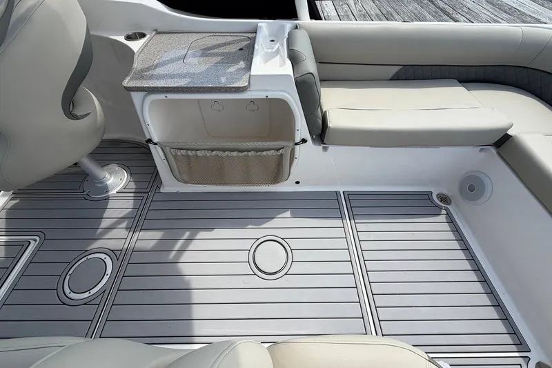 Slide: The Image of Interior of 2025 Key West 239 DFS boat with seating and storage area. - 13