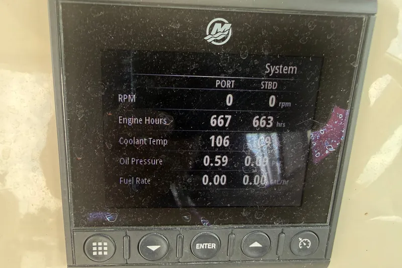 Slide: The Image of Display panel of a 2020 Boston Whaler 285 Conquest showing engine metrics. - 17
