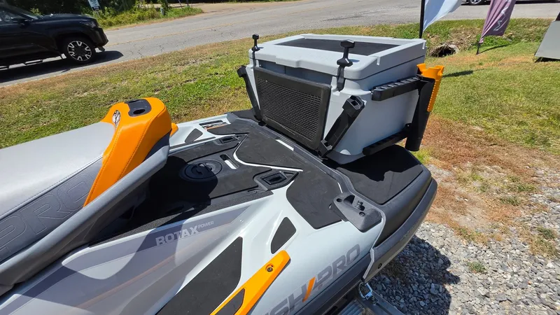 Slide: The Image of A 2023 Sea-Doo FishPro Trophy 170 iDF iBR with tech package. It features a large cooler at the back. - 15