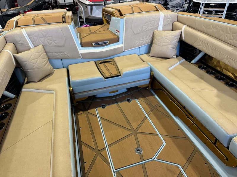 Slide: The Image of Luxurious interior of a 2026 Nautique Super Air Nautique G25 Paragon with sleek upholstery and wood flooring. - 20