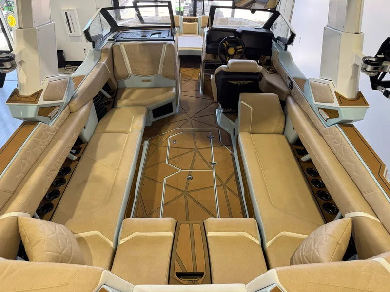 Slide: The Image of The image shows the luxurious interior of a 2026 Nautique Super Air Nautique G25 Paragon boat with elegant seating and modern design. - 17