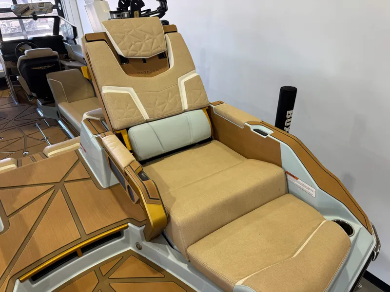 Slide: The Image of Luxurious reclining seat on a 2026 Super Air Nautique G25 Paragon, featuring sleek upholstery and modern design. - 15