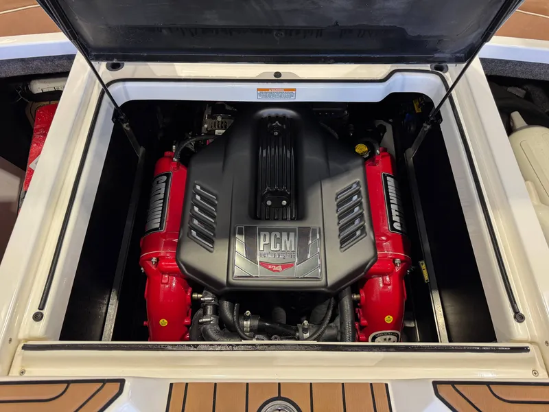 Slide: The Image of The engine compartment of a 2018 Nautique Super Air Nautique GS22 with a PCM engine. - 28