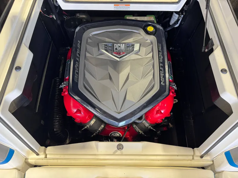 Slide: The Image of The engine compartment of a 2020 Nautique Super Air Nautique G23 with a powerful PCM engine. - 27