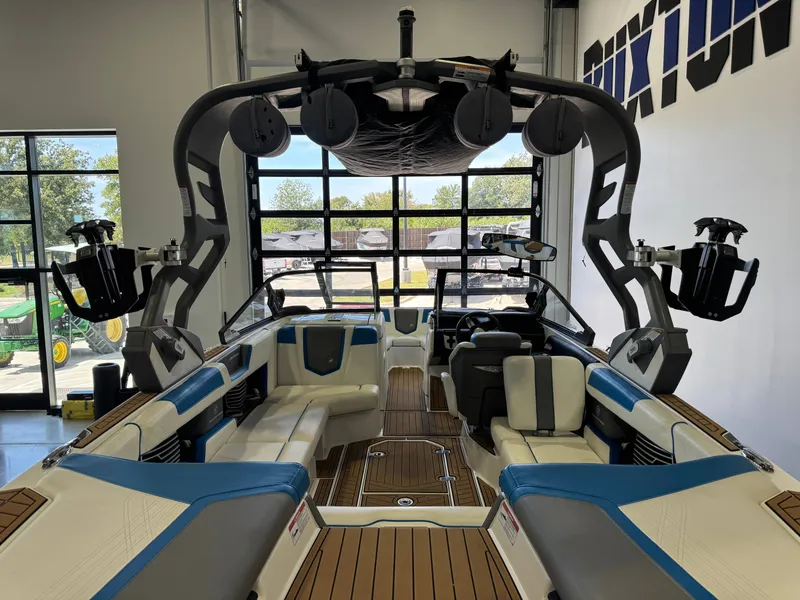Slide: The Image of The image shows the interior of a 2020 Super Air Nautique G23 with modern seating and a sturdy tower. - 9