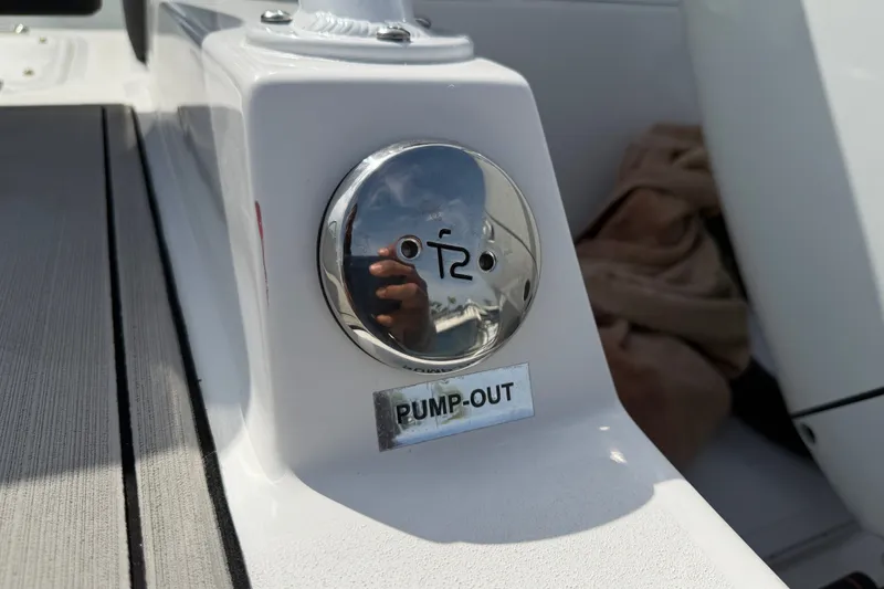 Slide: The Image of Pump-out valve on 2026 Sea Pro 245FLXR Sandbar boat deck. - 42