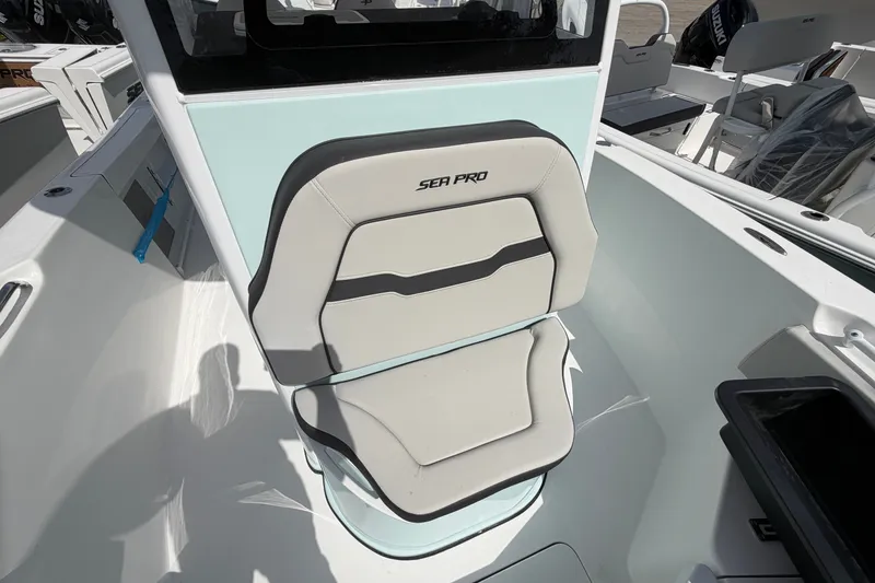 Slide: The Image of 2026 Sea Pro 245FLXR Sandbar boat seat with modern design and branding. - 27