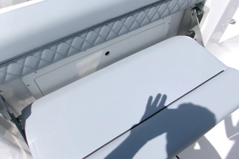 Slide: The Image of 2027 Sportsman Open 252 Center Console boat seat with quilted backrest detail. - 15