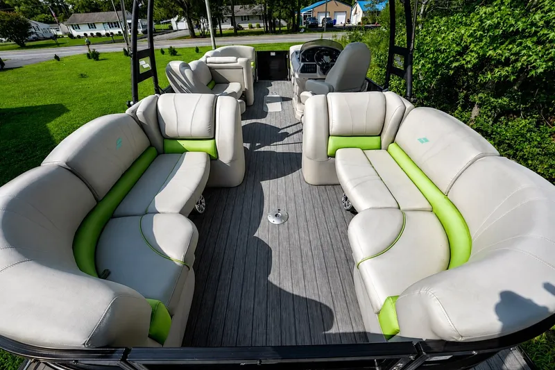 Slide: The Image of 2018 Starcraft SLS 5 Q pontoon boat with spacious seating and modern design. - 5