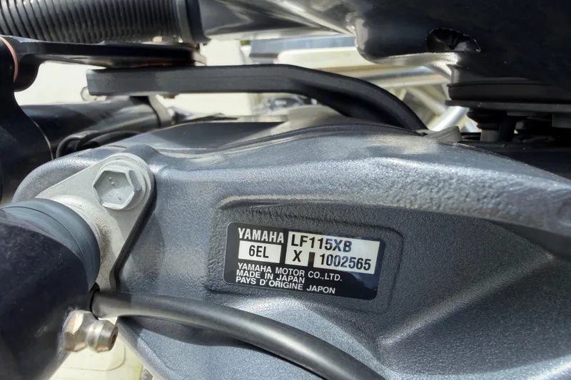Slide: The Image of Close-up of a Yamaha LF115XB engine on a 2022 World Cat 230 DC boat. - 75