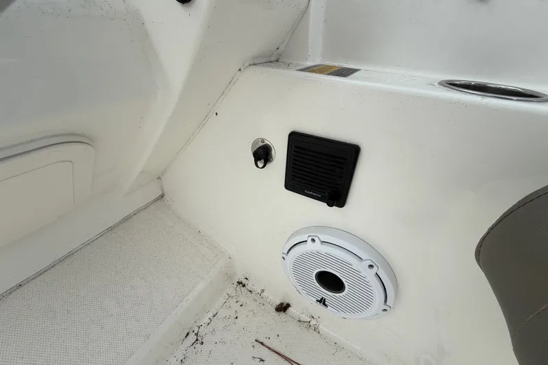 Slide: The Image of Interior of 2022 World Cat 230 DC boat with speaker and Garmin device. - 45