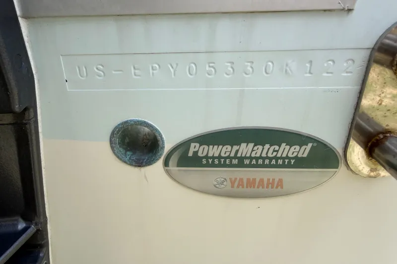 Slide: The Image of 2022 World Cat 230 DC boat with Yamaha PowerMatched System Warranty badge. - 77