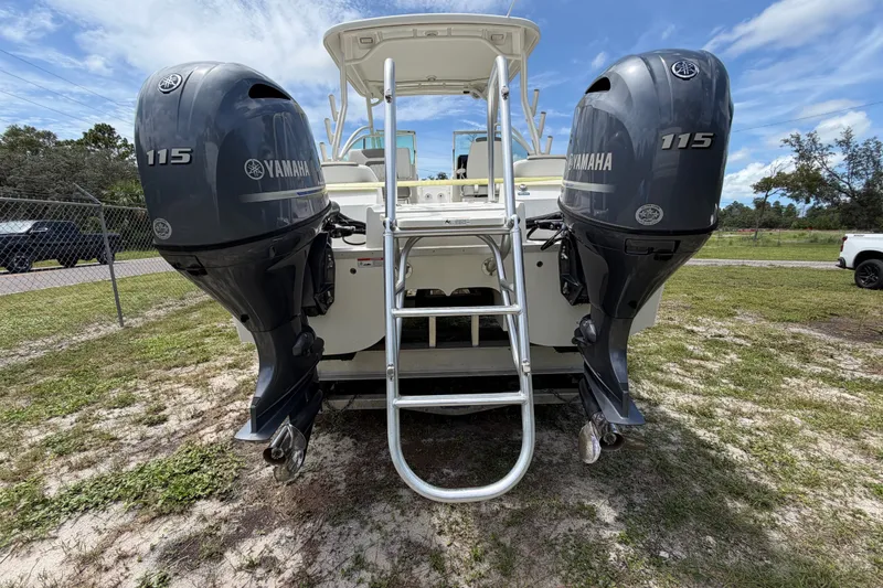 Slide: The Image of 2022 World Cat 230 DC boat with dual Yamaha 115 outboard engines. - 17