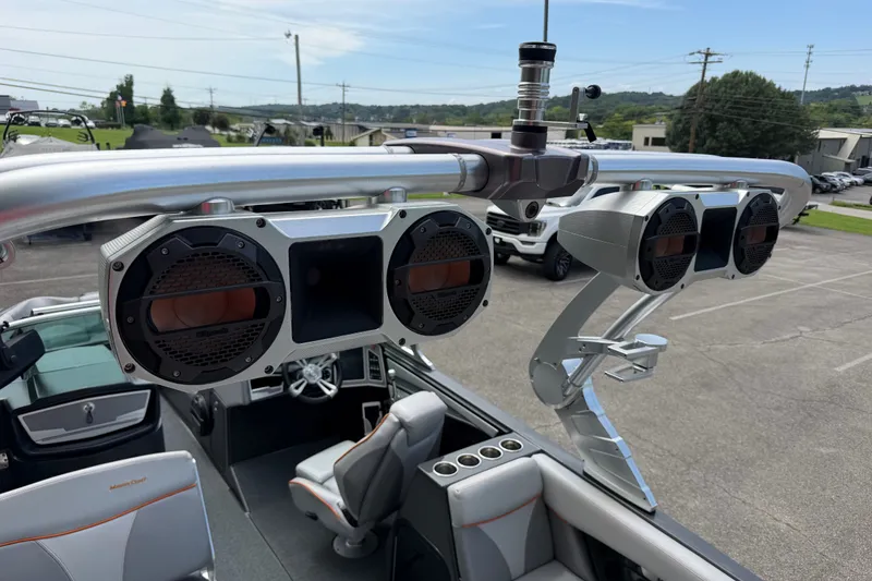 Slide: The Image of 2018 MasterCraft X26 boat with premium audio speakers and sleek interior design. - 15