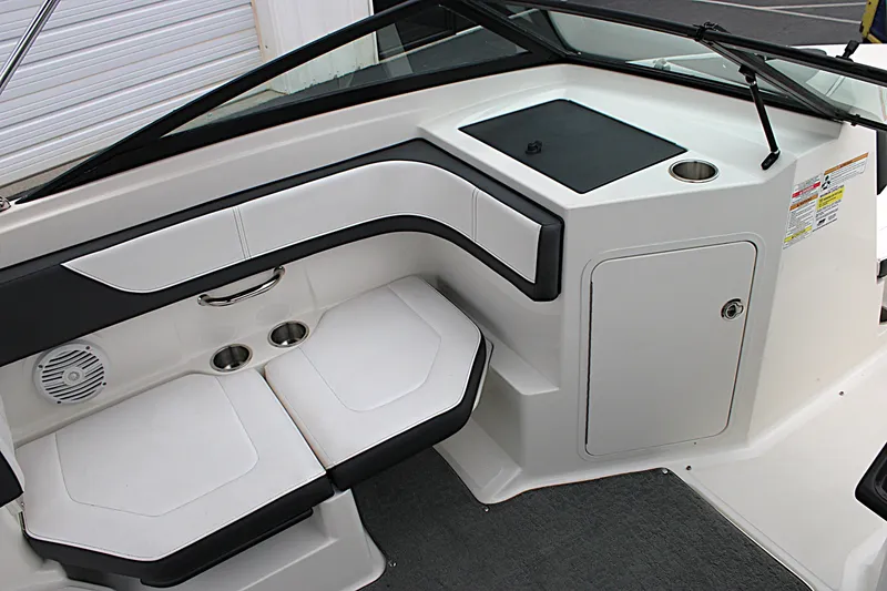 Slide: The Image of Interior view of 2017 Sea Ray SPX 190 Outboard boat, featuring seating and storage. - 16