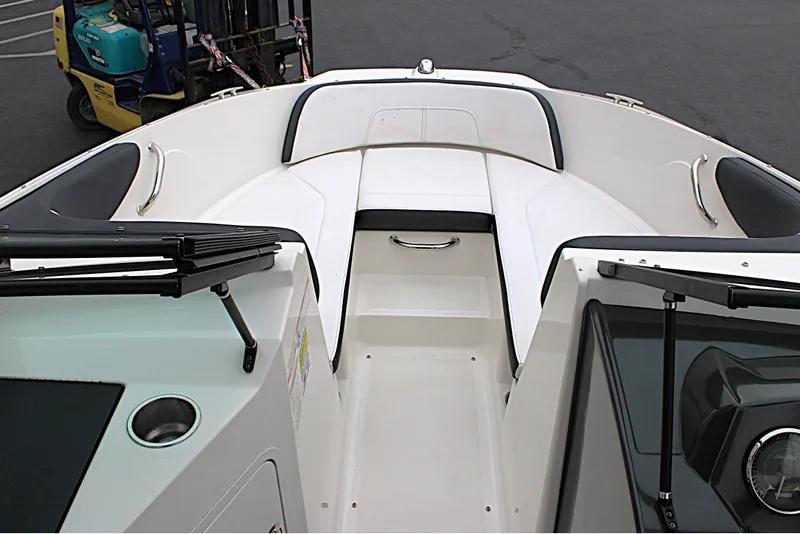 Slide: The Image of 2017 Sea Ray SPX 190 Outboard boat interior with seating and storage. - 19