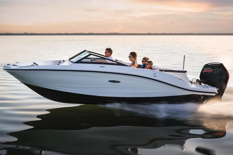 Slide: The Image of Manufacturer Provided Image: 2017 Sea Ray SPX 190 OB boat cruising on calm water at sunset. - 22