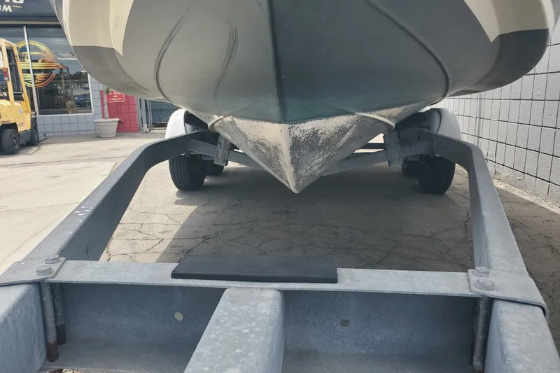 Slide: The Image of 2022 Defiance Commander 220 EX boat on trailer, viewed from below. - 26
