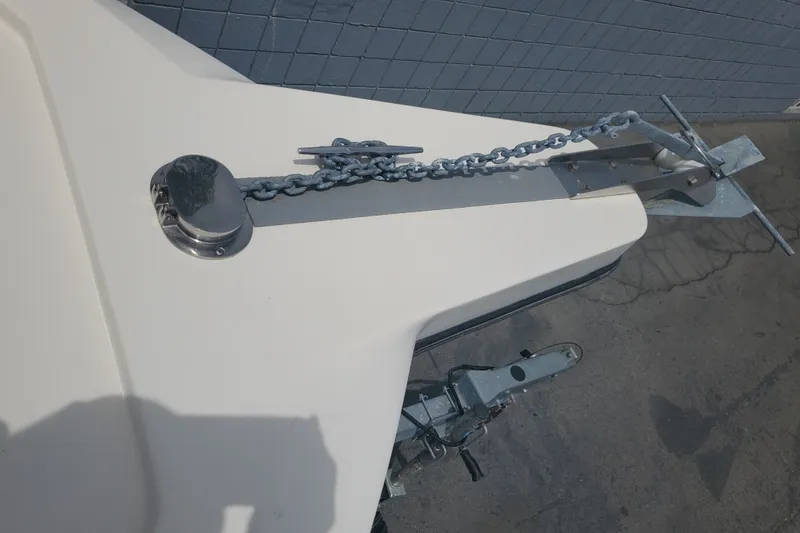 Slide: The Image of Bow of 2022 Defiance Commander 220 EX with anchor chain and cleat. - 11
