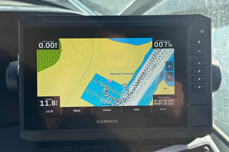 Slide: The Image of Garmin GPS display on 2008 Four Winns V248 boat, showing Cheboygan County Marina map. - 13