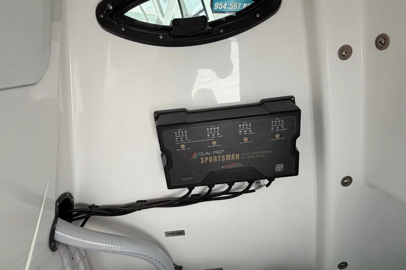 Slide: The Image of Battery charger panel on 2027 Sea Pro 262 DLX boat interior. - 48
