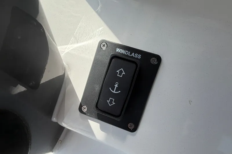Slide: The Image of Windlass control switch on 2027 Sea Pro 262 DLX boat dashboard. - 36