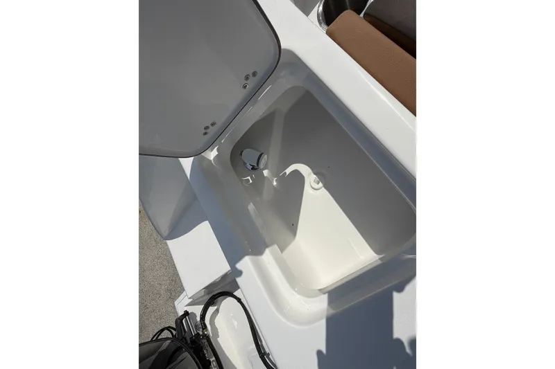 Slide: The Image of Open storage compartment on 2027 Sea Pro 262 DLX boat, showcasing interior space. - 49