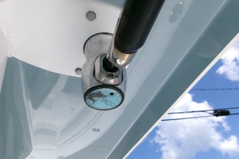 Slide: The Image of Close-up of a 2020 Sea Hunt Gamefish 25 boat component against a blue sky. - 23