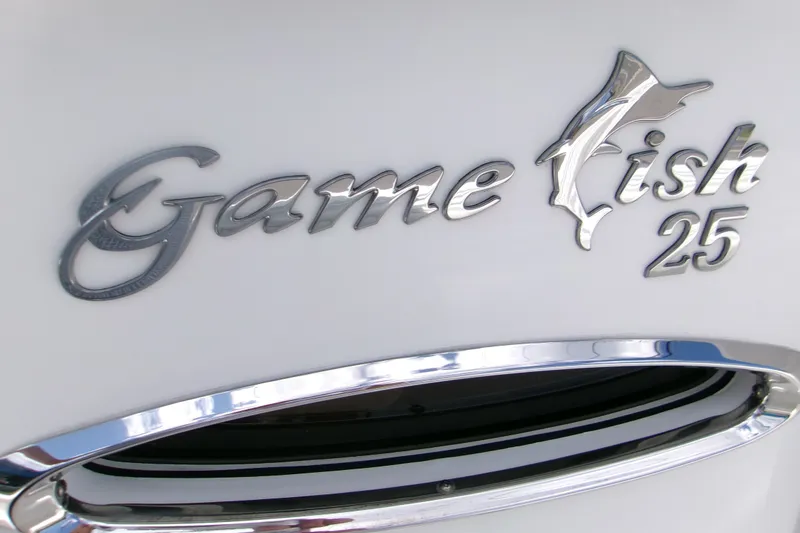 Slide: The Image of 2020 Sea Hunt Gamefish 25 logo on sleek white surface. - 25