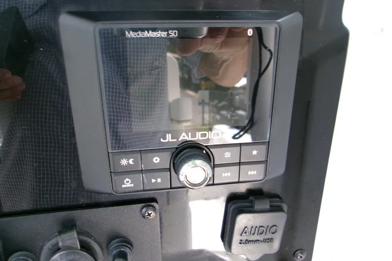 Slide: The Image of JL Audio MediaMaster 50 control panel on 2020 Sea Hunt Gamefish 25 boat. - 21
