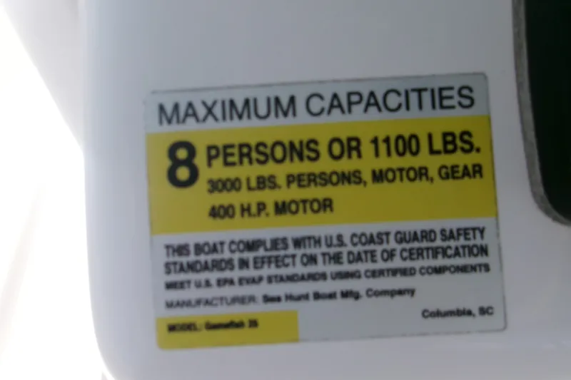 Slide: The Image of Maximum capacity label on 2020 Sea Hunt Gamefish 25 boat, 8 persons or 1100 lbs. - 24