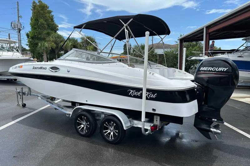 Slide: The Image of 2013 SouthWind 212 SD boat on trailer with Mercury outboard motor. - 4