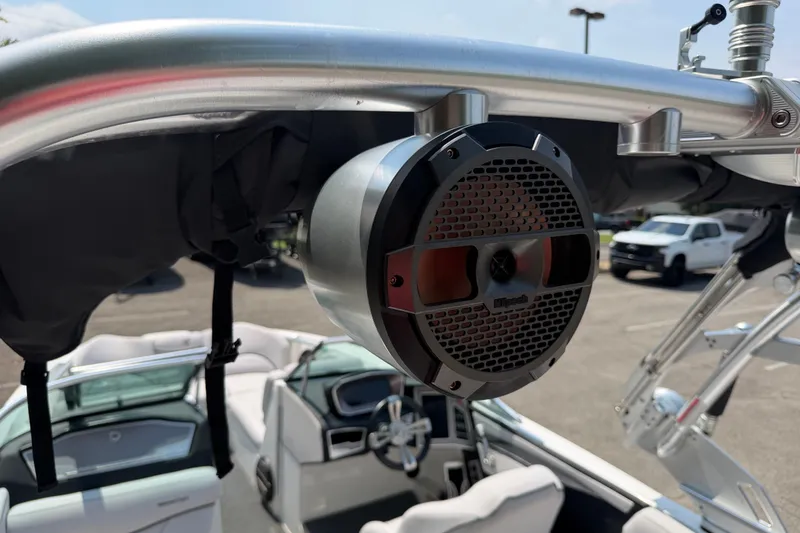 Slide: The Image of 2018 MasterCraft X46 boat with mounted speaker and sleek interior design. - 14