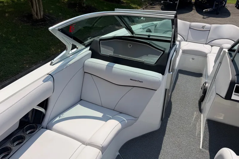 Slide: The Image of 2018 MasterCraft X46 boat interior with luxurious white seating and modern design. - 8