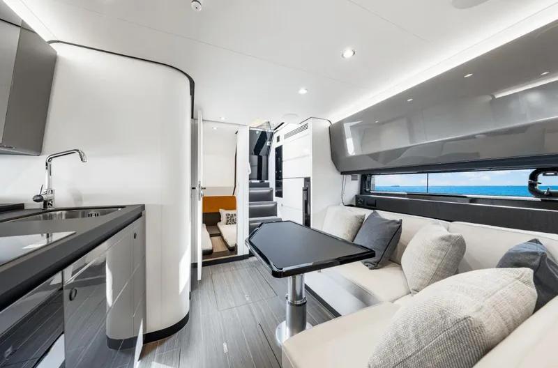 Slide: The Image of Interior of the 2025 Azimut Verve 48 with modern kitchen and stylish living area. - 7