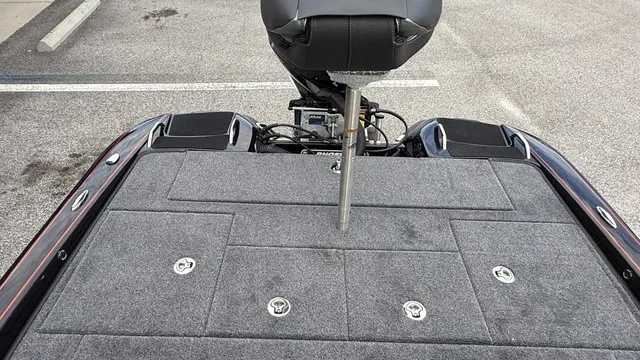 Slide: The Image of The image shows the rear deck of a Phoenix 721 ZXL boat with gray carpeting and a seat. - 16